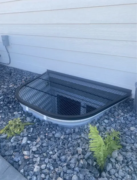 Close-up of the framing and grid on an MWAC window well cover